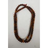 A Chinese horn bead necklace, 58" long