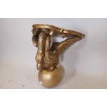 A C19th carved giltwood wall bracket in the form of a swan, the top pointed as marble, 18" high x 19