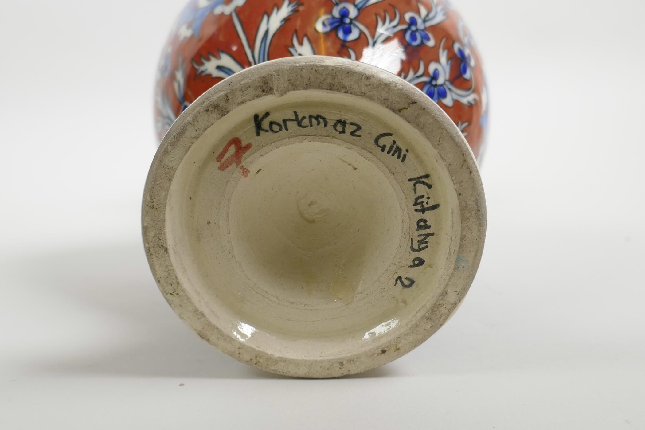 An early C20th Turkish Kutahya pottery ewer with traditional floral decoration, repair to handle, 10 - Image 7 of 7