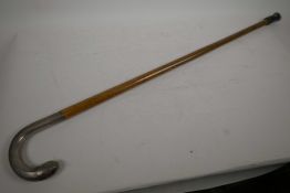 A Malacca walking stick with hallmarked silver handle, 34" long