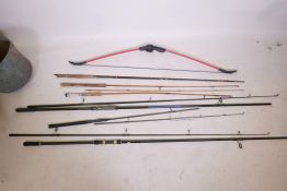 A Geologic Discovery 100 bow, 53½" long, together with six fishing rods