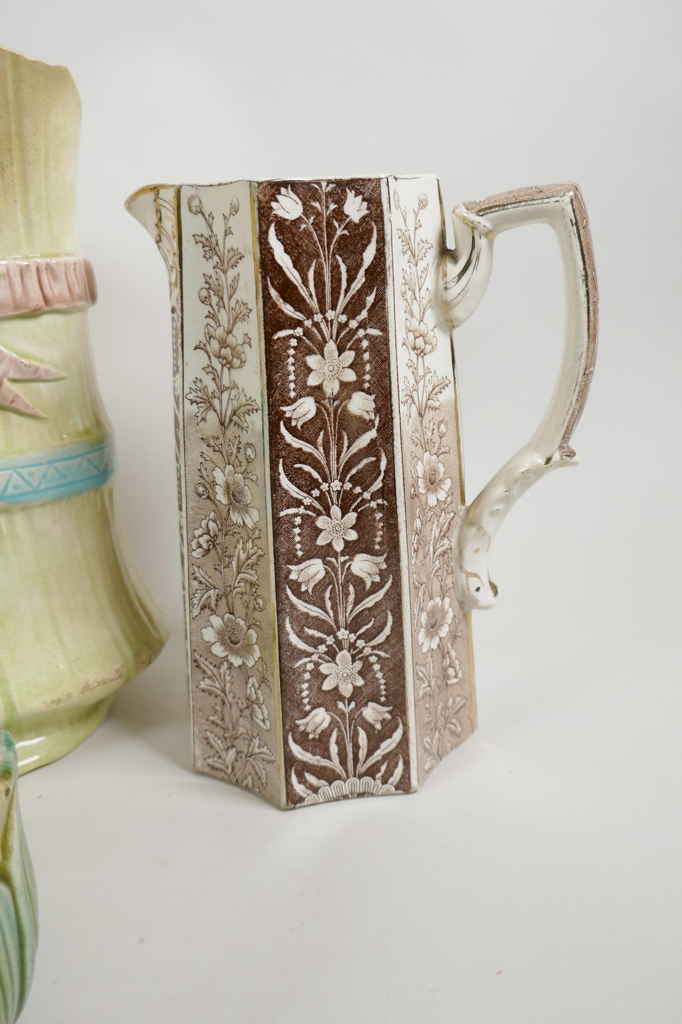 A C19th stoneware jug with embossed decoration of roses, thistles and classical figures, 7½" high, t - Image 5 of 5