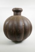 An Indian metal gourd shaped water pot, 17½" high