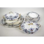 A C19th Staffordshire part dinner service including three oval platters, two oval tureens and covers