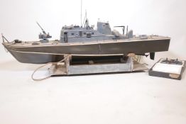 A radio controlled scratch built wood model of a German Navy fast patrol boat, length 52", beam 12"