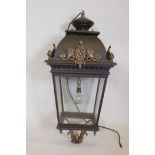 A large metal ceiling lantern with gilt features, 38"