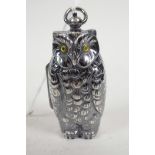 A silver plated sovereign and half sovereign case cast in the form of an owl, 2½" long