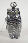 A silver plated sovereign and half sovereign case cast in the form of an owl, 2½" long