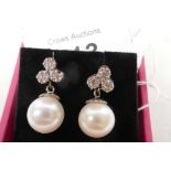 A pair of 18ct white gold, diamond and cultured pearl drop earrings