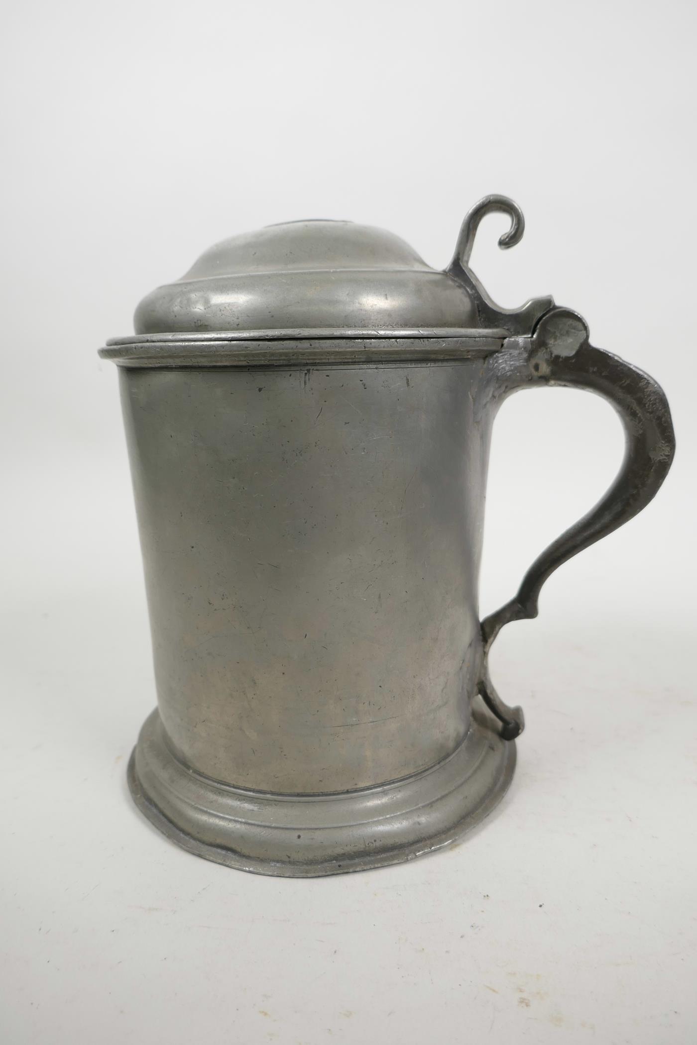 A collection of C18th pewter vessels including a large lidded tankard, English c.1780, with double d - Image 2 of 5