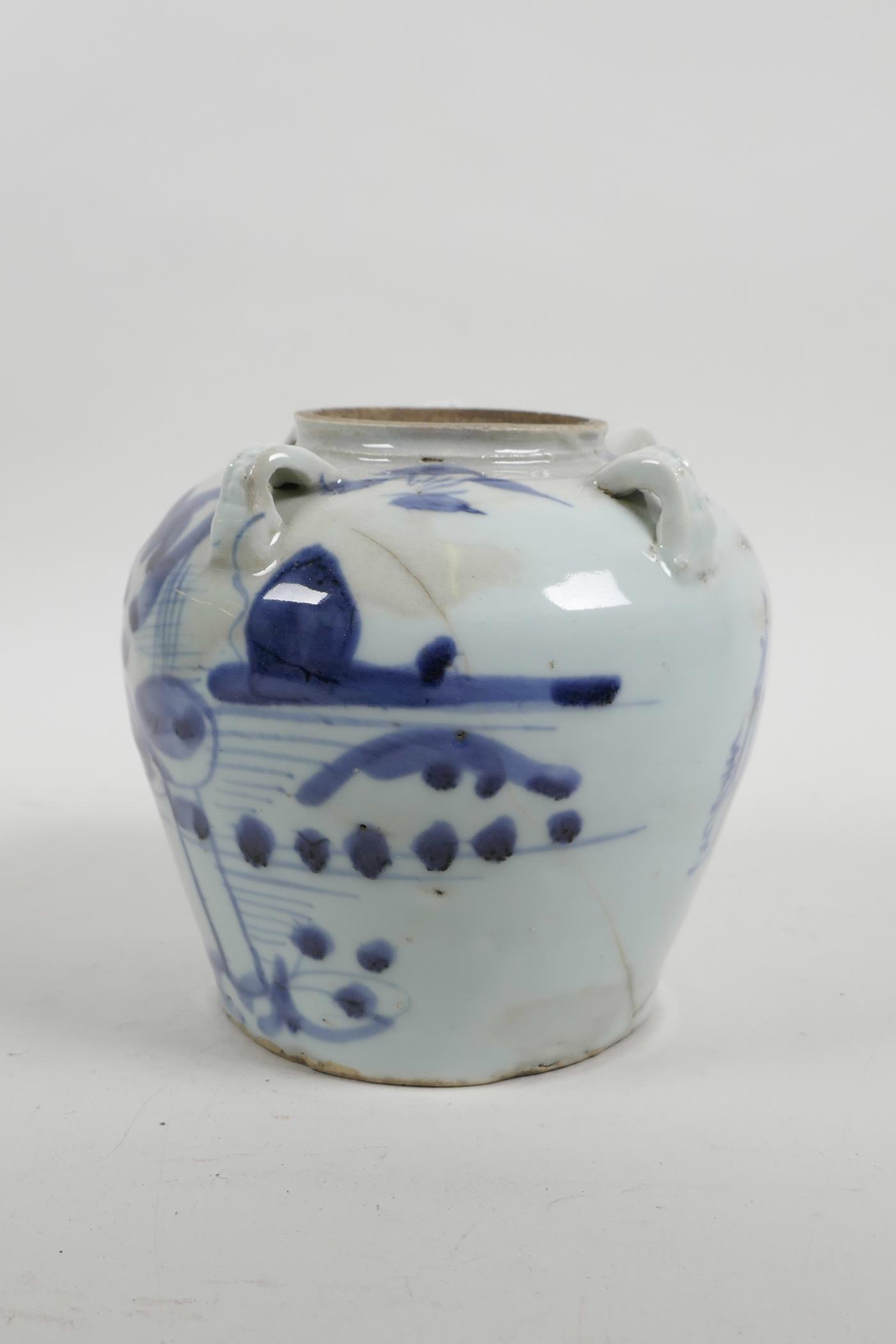 A Chinese blue and white porcelain pourer/pot with four lug handles and decorated with a stylised la - Image 4 of 5
