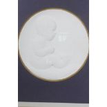 A plaster relief of a child, signed E. Sheen and dated 1916, 6" diameter (framed)