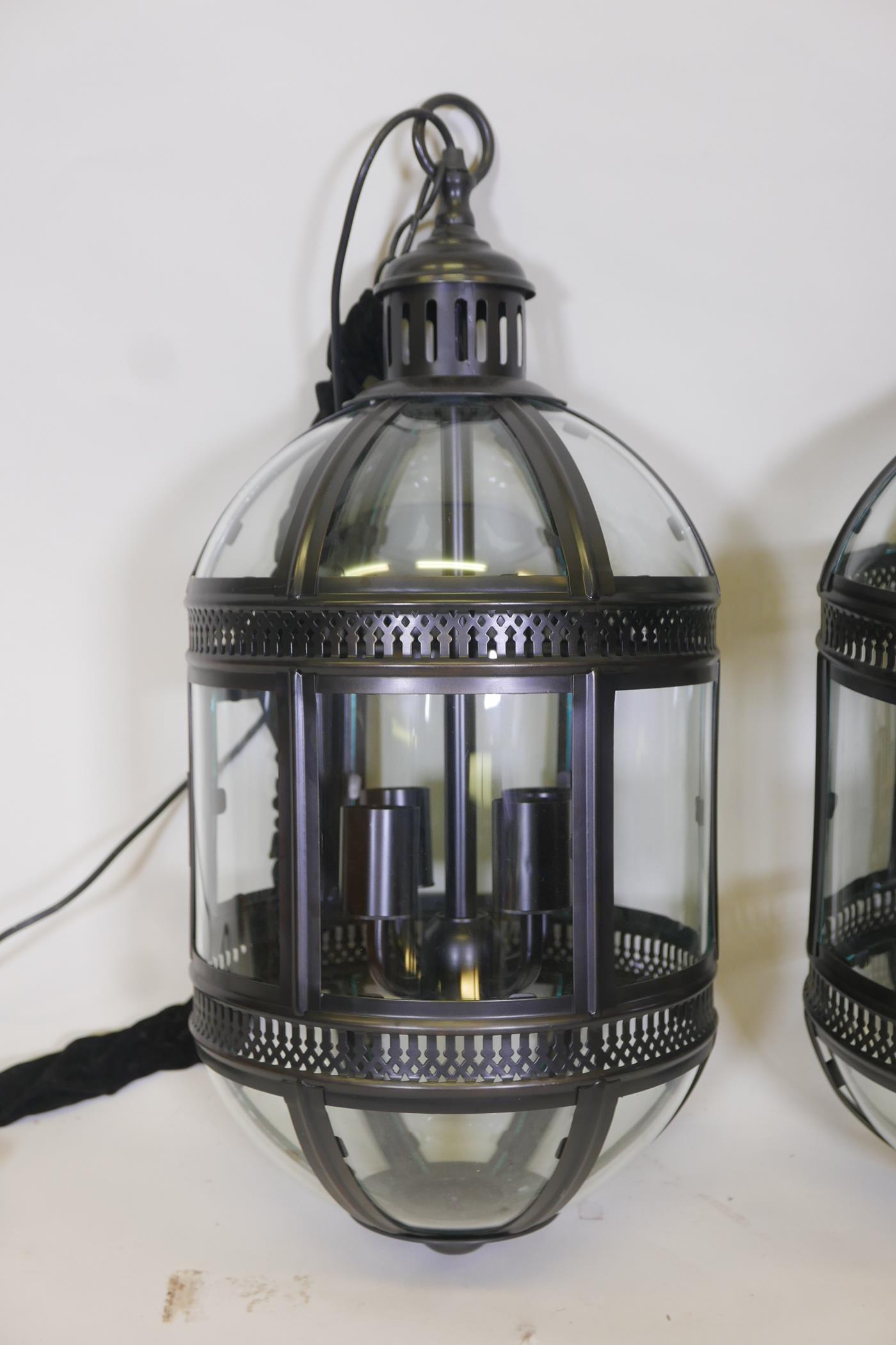 A pair of contemporary bronzed metal pendant lanterns, 27" long - Image 2 of 2