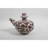 A Chinese red and white porcelain water pourer with scrolling floral decoration, 6" high x 6" diamet