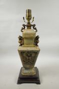 A Chinese sectional soapstone jar and cover with carved archaic decoration, converted for