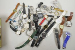 A box of various wristwatches etc