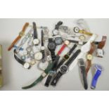 A box of various wristwatches etc