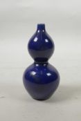 A small Chinese powder blue glazed double gourd vase, seal mark to base, 4" high