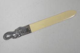 A Russian silver and bone letter opener, the handle formed as an elephant's head, 10½" long