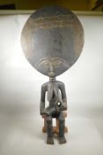 A large African Akuba fertility figure with a moon head, 41" high
