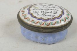 An early C19th Bilston enamel pill box, the cover bears motto 'May the Sword of Justice be swayed by