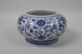 A Chinese blue and white porcelain jar with decorative floral panel, 4 character mark to side, 7"