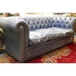 A blue leather high back Chesterfield three seater sofa, 88" x 42", 33" high