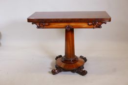 A good William IV figured mahogany card table, with carved and moulded frieze, raised on a