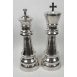 A pair of large ornamental plated King and Queen chess pieces, 13½" high