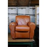 A La-Z-Boy armchair, upholstered in tan leather