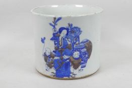 A Chinese ceramic brush pot, decorated in blue and white with iron red highlights, 6 figure
