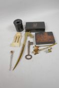 A quantity of collector's items including stamp box, printer's block, claw and ball button hook,