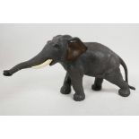 A Japanese Meiji period bronze figure of an elephant, signed Seiya Saku, 7" high, 13" long