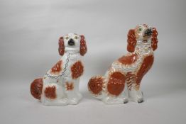 A C19th Staffordshire dog and another newer, largest 12" high