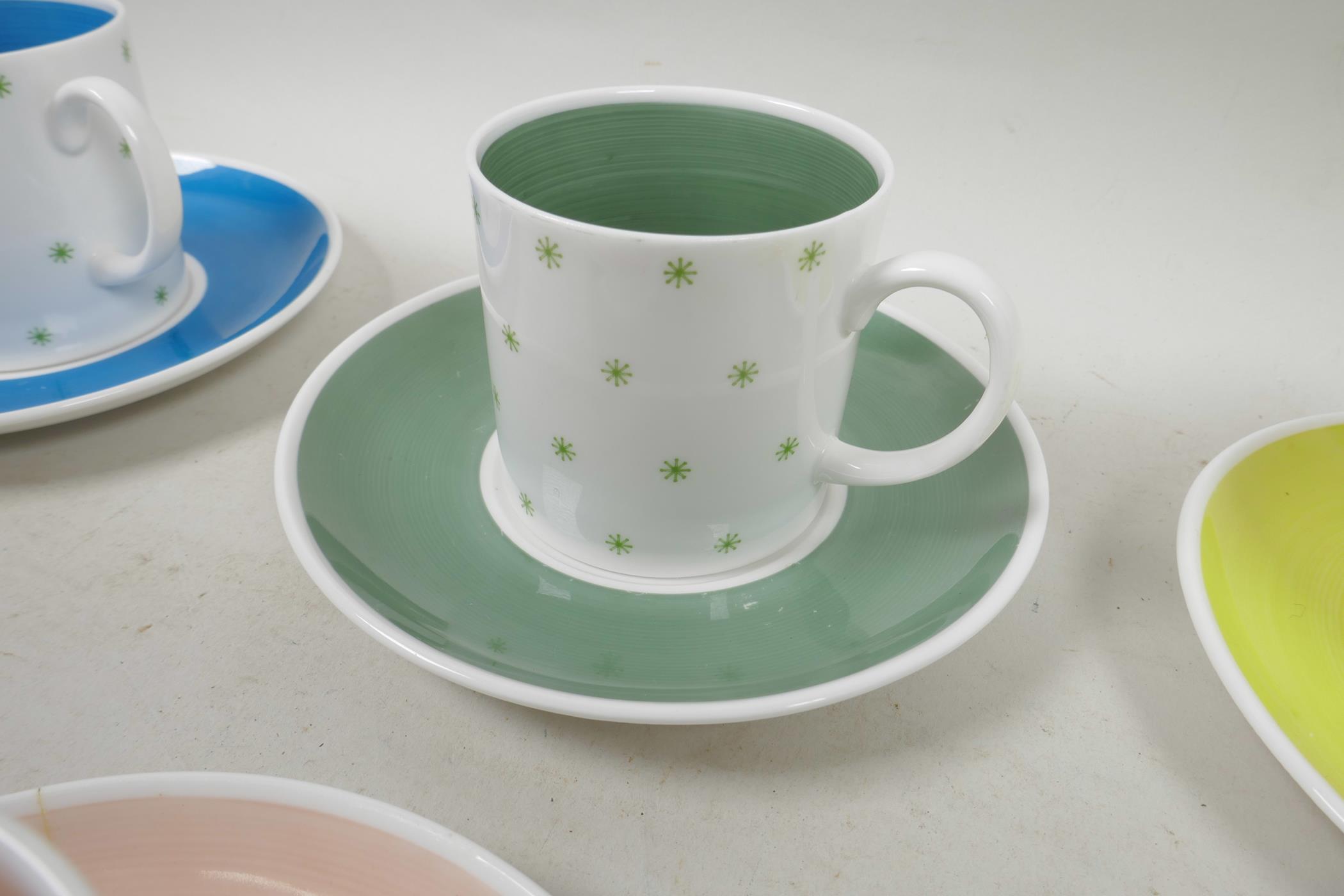 A Susie Cooper six cup and saucer coffee set with green star decoration, A/F, 5½" diameter - Image 4 of 9