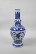 A Chinese Ming style blue and white porcelain vase with scrolling lotus flower decoration, 6