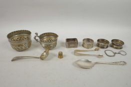 A Victorian hallmarked silver cream jug, sugar bowl and tea strainer by John Henry Rawlings (