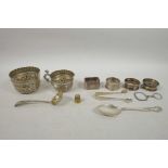 A Victorian hallmarked silver cream jug, sugar bowl and tea strainer by John Henry Rawlings (