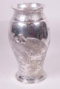 A Japanese Meiji period plated metal vase, embossed and engraved with figures of cranes, 12" high