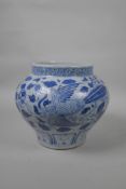 A Chinese blue and white Yuan style jar decorated with phoenix and flowers, 8" high