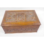 A Chinese carved hardwood box decorated with figures in a garden scene, 12¼" x 5¾" x 8"