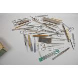 A box of medical dissecting tools etc
