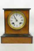 A c.1900 burr walnut and ebonised mantel clock, possibly French, with flat ebonised top and