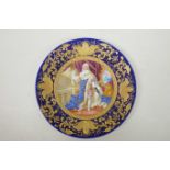 A Continental porcelain cabinet plate decorated with a printed regal portrait, a blue glazed rim and