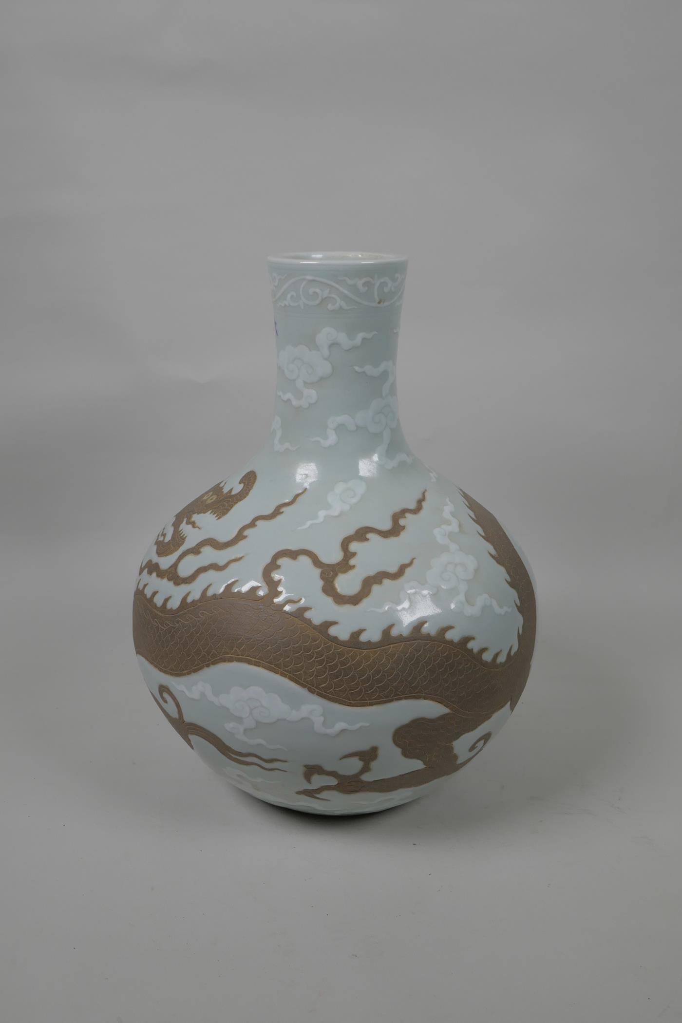 A Chinese Ming style red and white porcelain vase decorated with a red dragon in flight, 6 character - Image 2 of 5