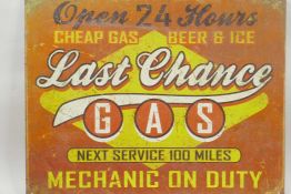 A replica road sign, 'Last Chance Service Station', 16" x 12½"