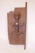 An African carved hardwood door decorated with a female nude figure, 66" high x 26" wide