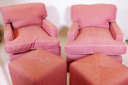 A pair of deep back contemporary armchairs, raised on tapering supports, each with a footstool
