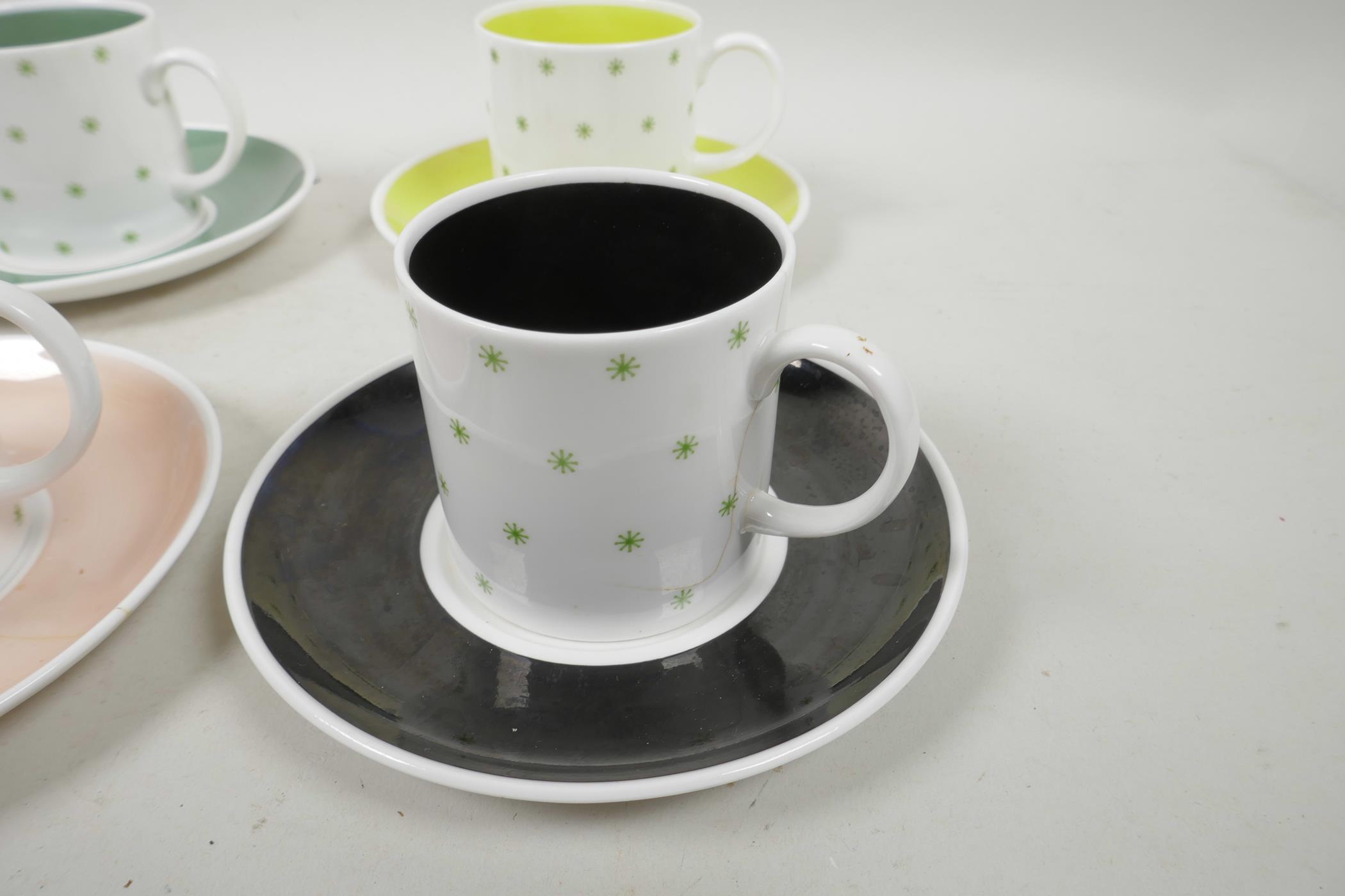 A Susie Cooper six cup and saucer coffee set with green star decoration, A/F, 5½" diameter - Image 6 of 9
