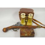 A pair of cased antique ivorine binoculars, together with a replica flint lock pistol and a